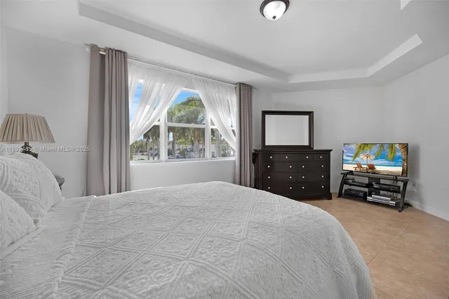 a bathroom with a double vanity sink and mirror