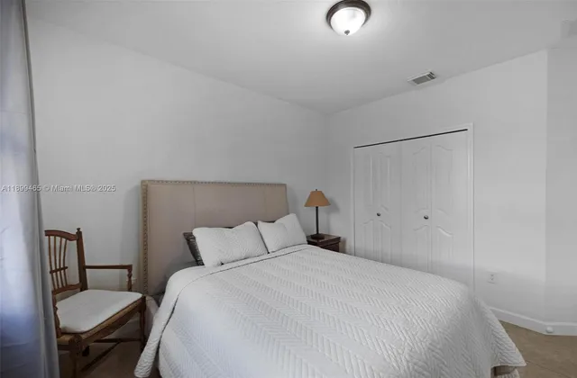 a bathroom with a bathtub and a toilet