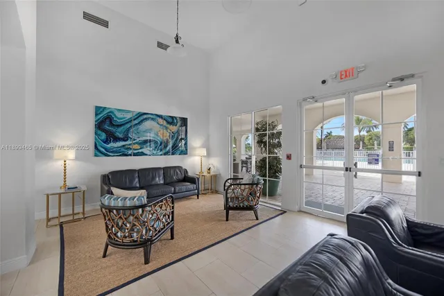 a view of a backyard with sitting area