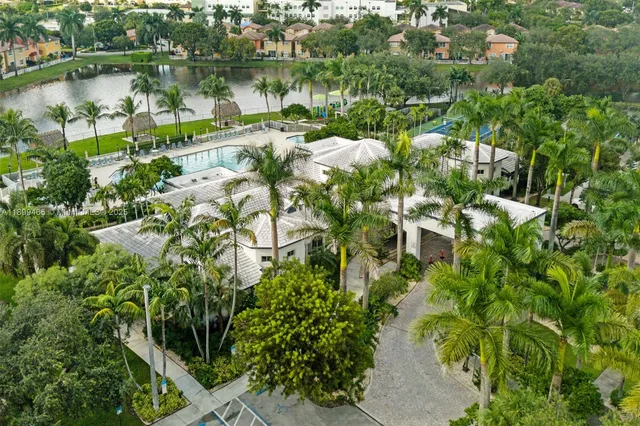 a view of a swimming pool with a yard