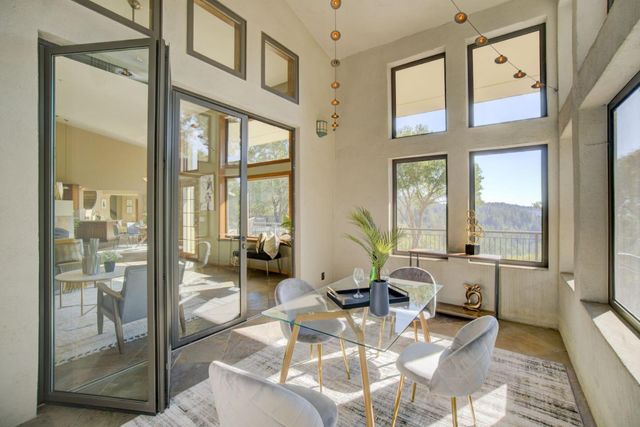 a view of a livingroom with furniture and window