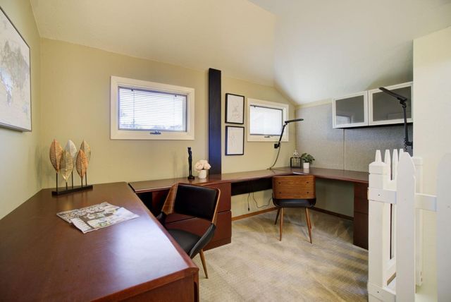 a view of balcony with furniture