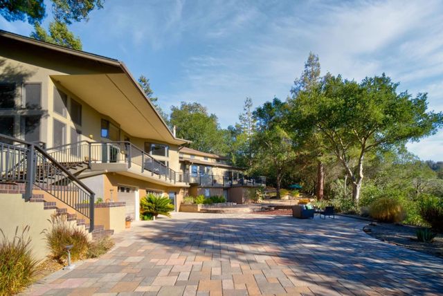 a view of balcony with furniture