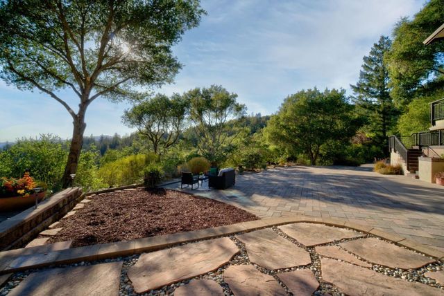 a view of a dining room and a table or chandelier