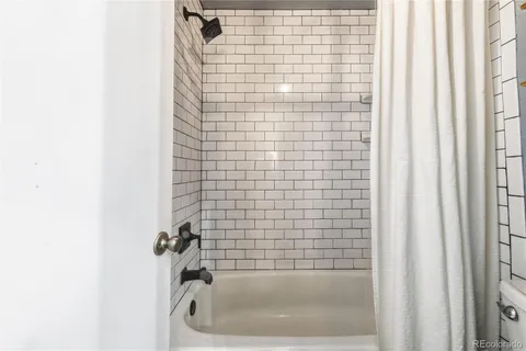 a bathroom with a bathtub