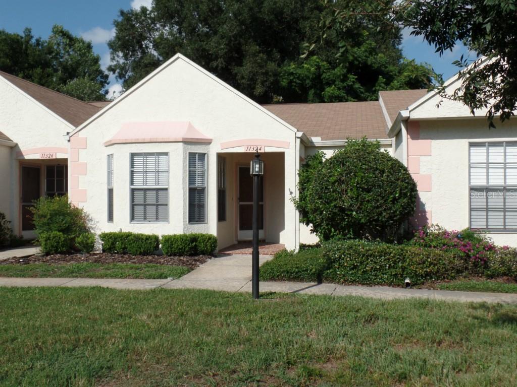 11324 Versailles Lane, Unit B7 Port Richey, FL 34668 - Photo 1 of 1 Chateau Village Condo units are attractive and this one is ready for occupancy.