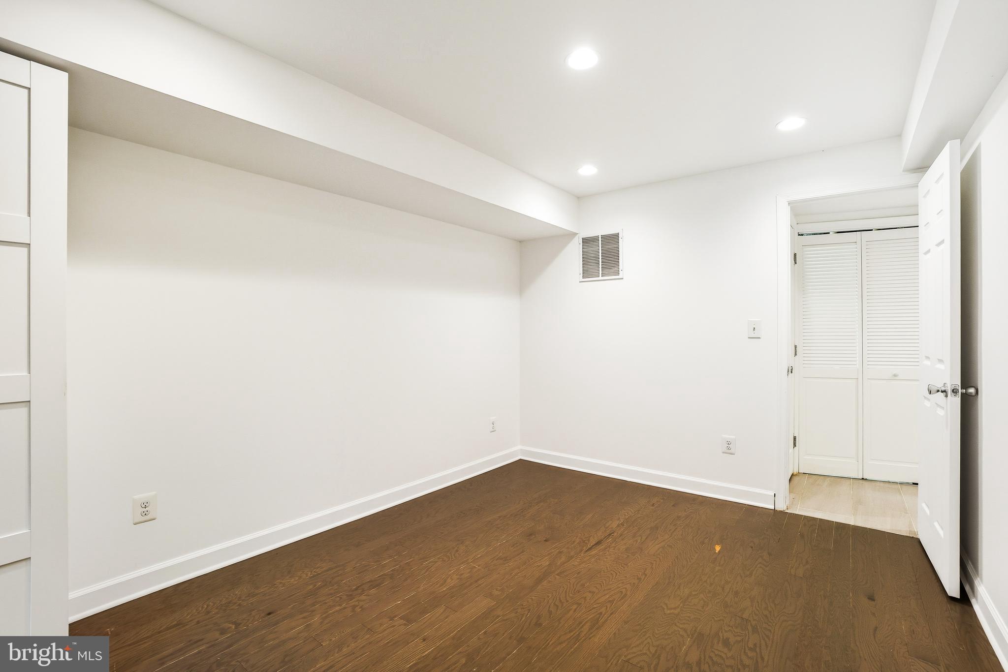 3114 19th Street South Arlington, VA 22204 - Photo 12 of 31 an empty room with wooden floor