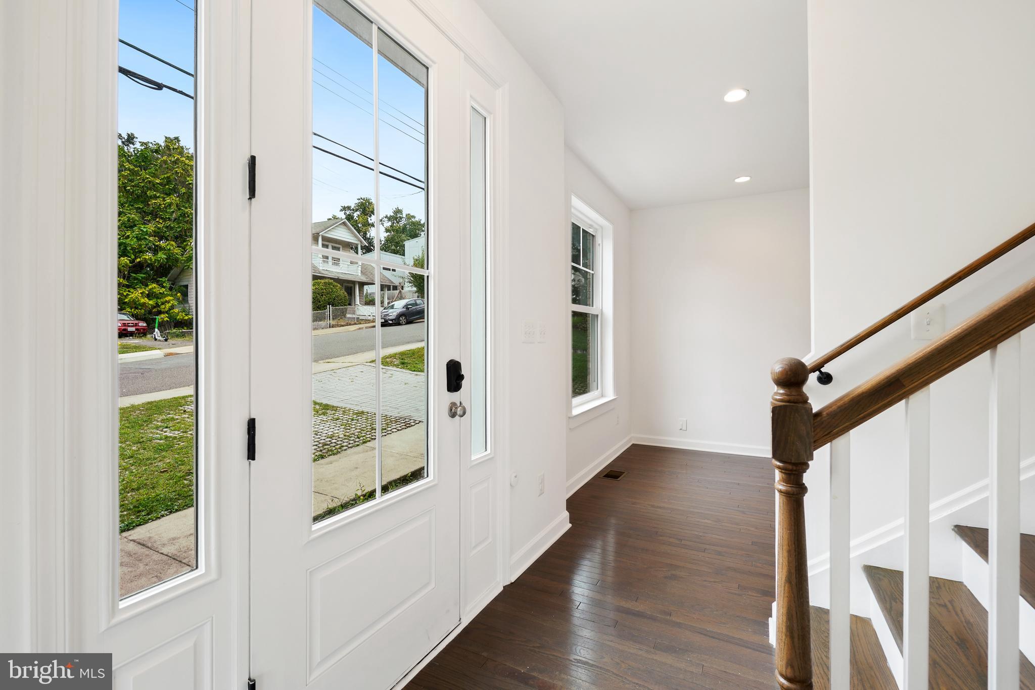 3114 19th Street South Arlington, VA 22204 - Photo 21 of 31 a view of entryway with wooden floor and windows
