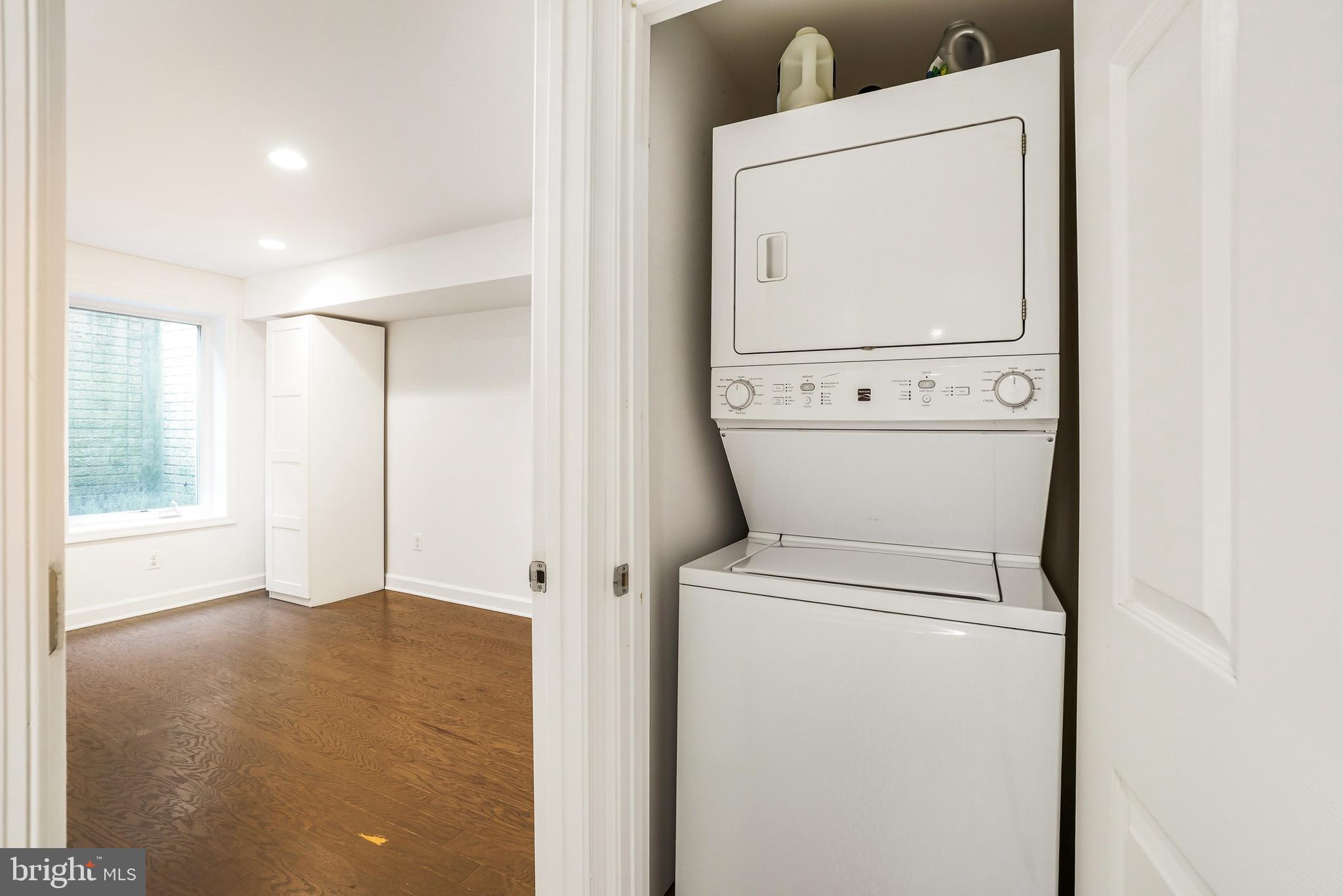 3114 19th Street South Arlington, VA 22204 - Photo 29 of 31 a view of a storage & utility room with washer and dryer