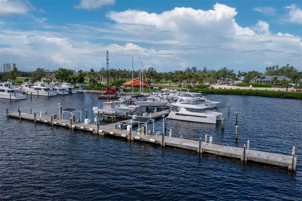 2800 Harbourside Drive, Unit E06 Longboat Key, FL 34228 - Photo 23 of 55 a view of a lake with a city view