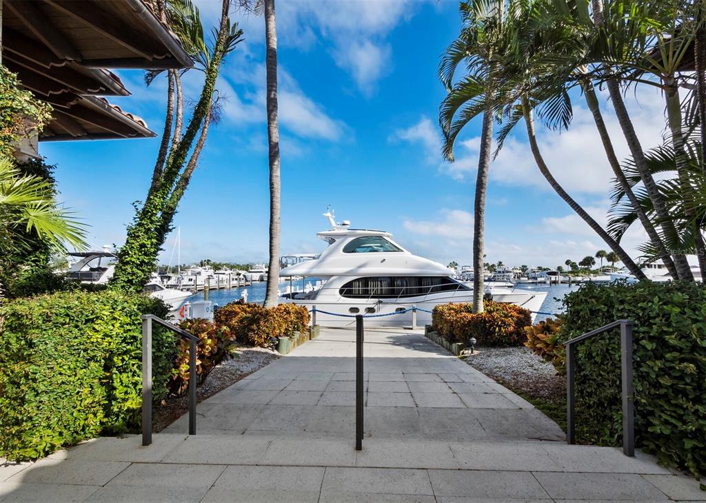 2800 Harbourside Drive, Unit E06 Longboat Key, FL 34228 - Photo 28 of 55 a outdoor space with lots of palm trees