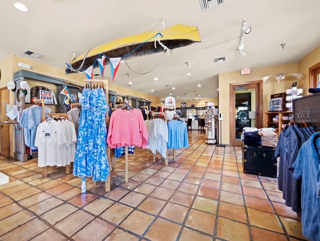 2800 Harbourside Drive, Unit E06 Longboat Key, FL 34228 - Photo 30 of 55 a view of a entryway door with a couch