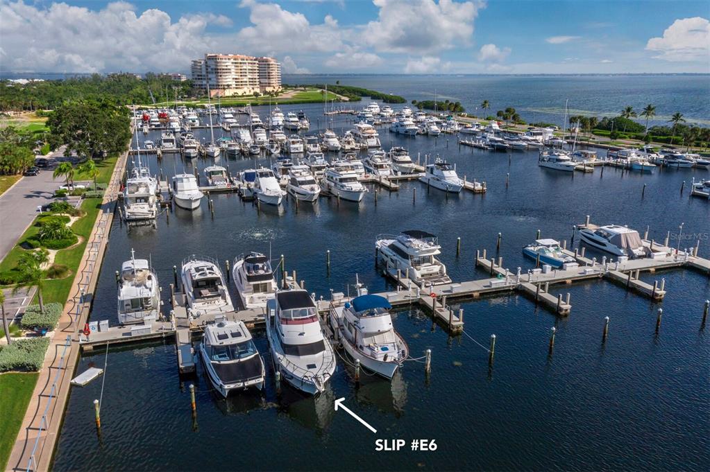 2800 Harbourside Drive, Unit E06 Longboat Key, FL 34228 - Photo 3 of 55 a view of a lake with sitting area