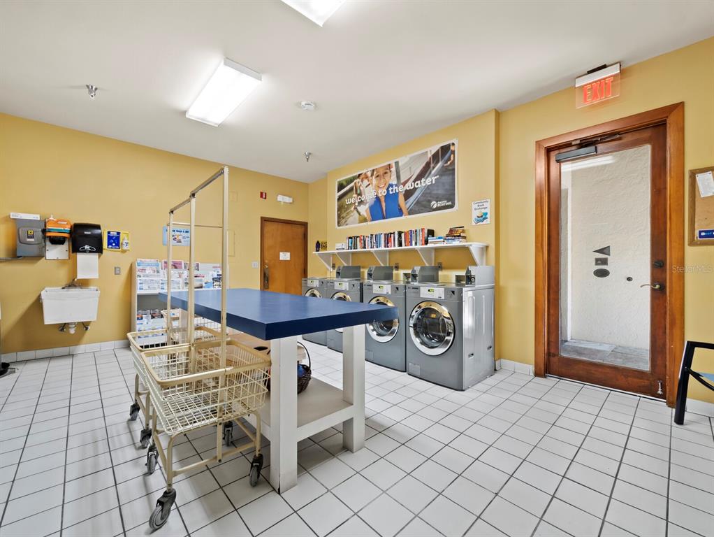 2800 Harbourside Drive, Unit E06 Longboat Key, FL 34228 - Photo 34 of 55 a view of a entryway with furniture and a livingroom