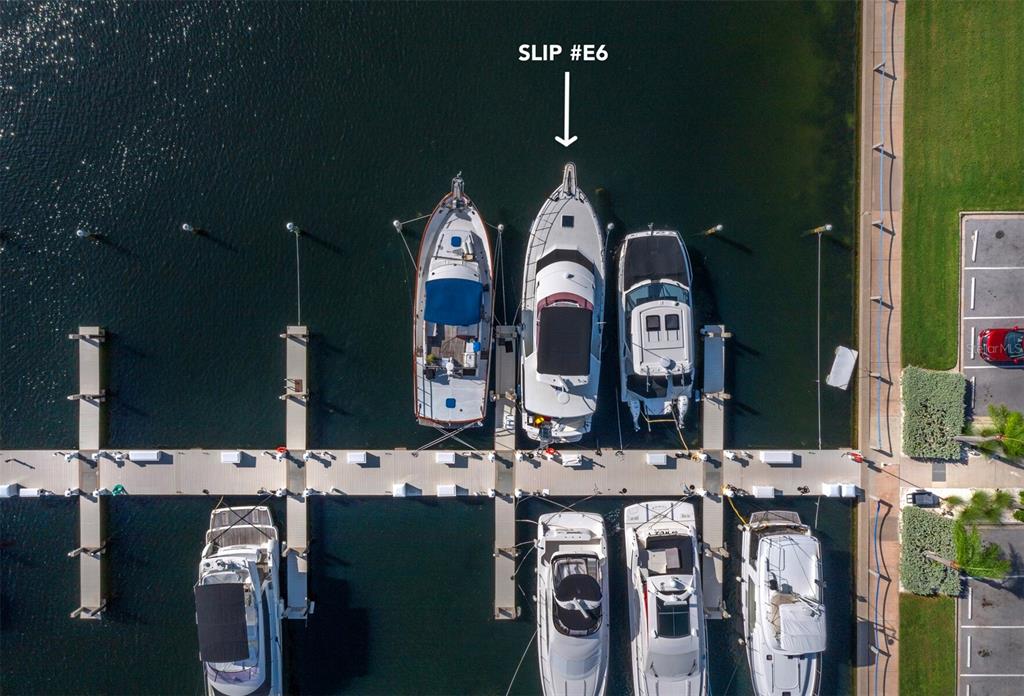 2800 Harbourside Drive, Unit E06 Longboat Key, FL 34228 - Photo 7 of 55 a view of gym equipment and kitchen view