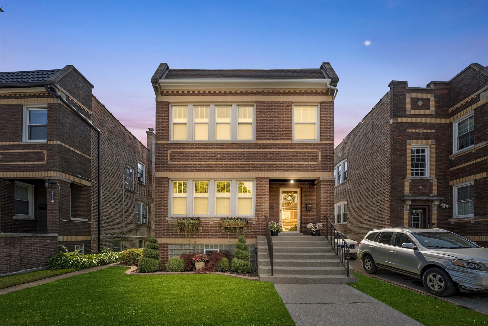 2124 Wesley Avenue Berwyn, IL 60402 - Photo 1 of 2 a house view with a garden space
