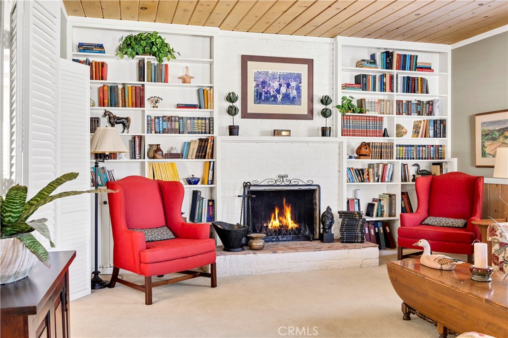 27454 Hemet Street Hemet, CA 92544 - Photo 26 of 51 a living room with furniture and a fireplace