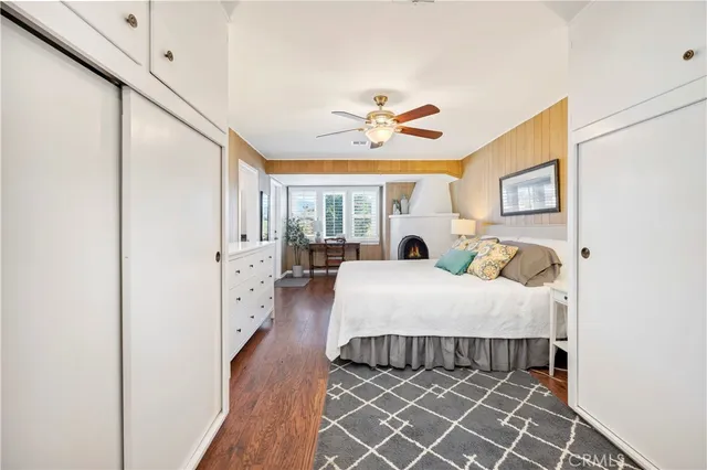 a bed room with a bed and a chandelier