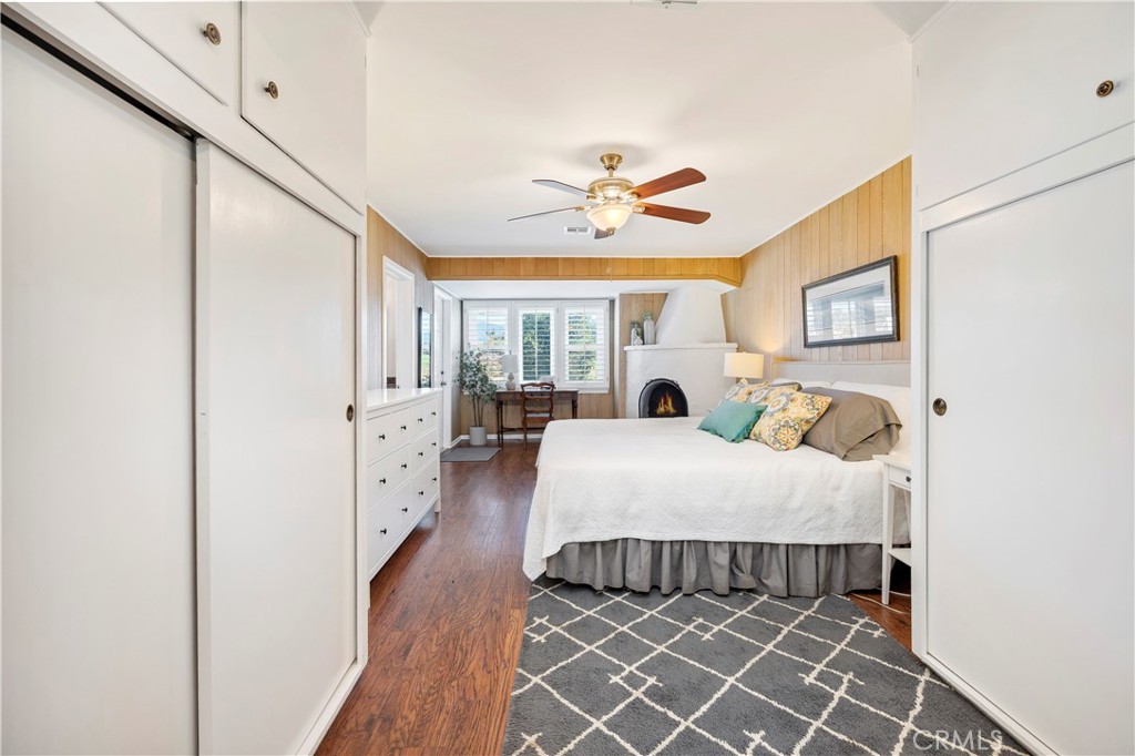 27454 Hemet Street Hemet, CA 92544 - Photo 30 of 51 a bed room with a bed and a chandelier