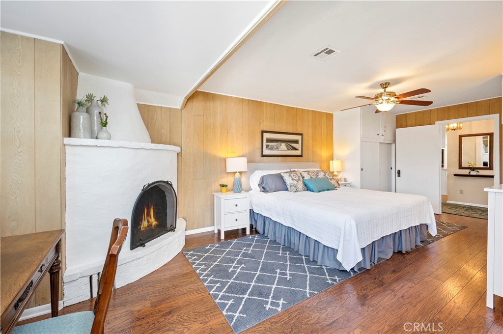 27454 Hemet Street Hemet, CA 92544 - Photo 33 of 51 a bedroom with bed and a fireplace