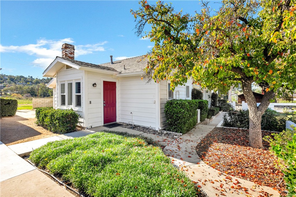 27454 Hemet Street Hemet, CA 92544 - Photo 38 of 51 a view of a house with a small yard and potted plants
