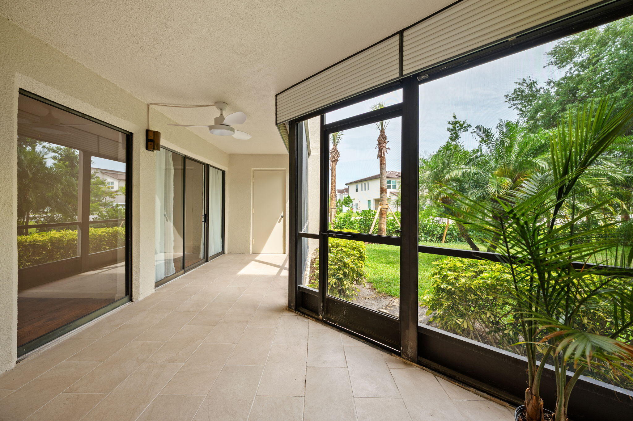 5701 Camino Del Sol, Unit 104 Boca Raton, FL 33433 - Photo 18 of 34 screened patio