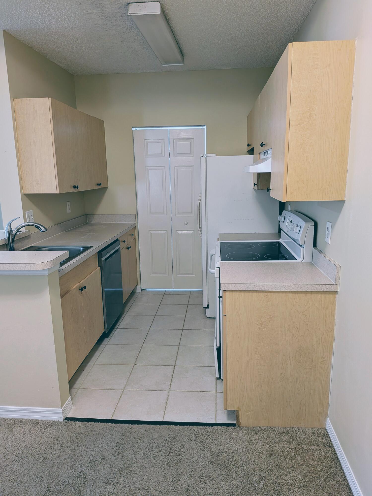 10348 Fox Trail Road South, Unit 513 Royal Palm Beach, FL 33411 - Photo 6 of 13 UNIT 513 KITCHEN - Copy