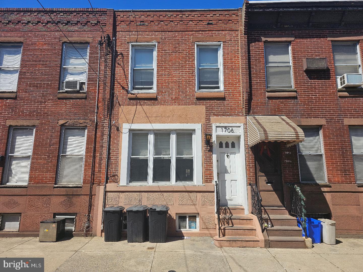 1706 South Chadwick Street Philadelphia, PA 19145 - Photo 1 of 1 a front view of a building with a outdoor space