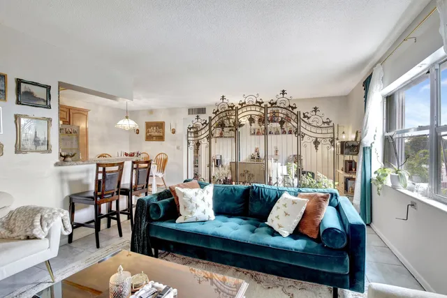 a bathroom with a sink a toilet and shower curtain