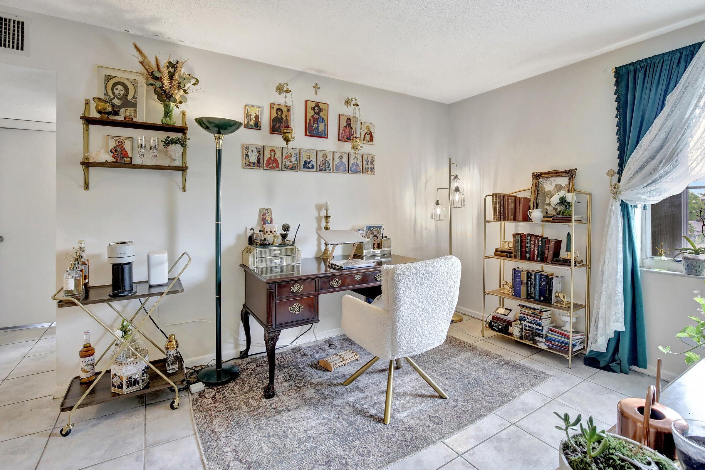 1750 Jefferson Street, Unit 305 Hollywood, FL 33020 - Photo 27 of 43 a view of a workspace with furniture and toys