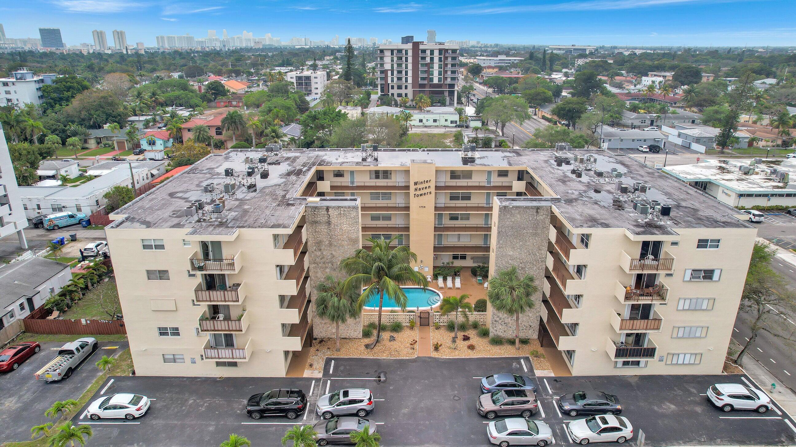 1750 Jefferson Street, Unit 305 Hollywood, FL 33020 - Photo 33 of 43 a view of a city with tall buildings