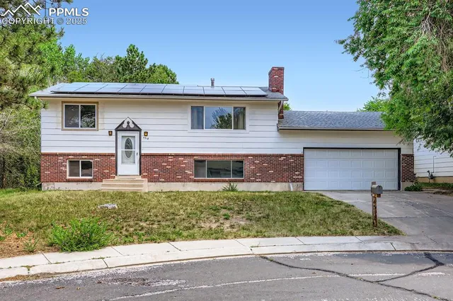 front view of a house with a street