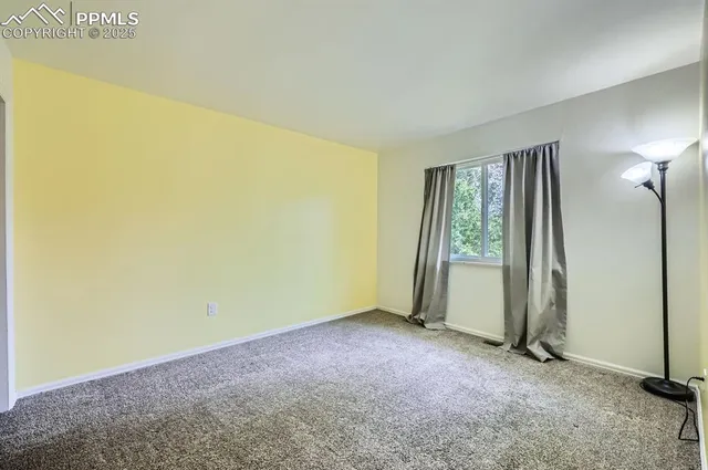 an empty room with window