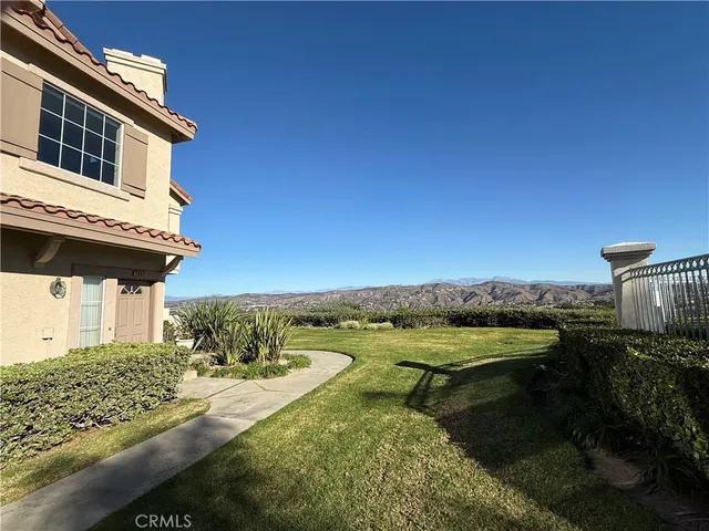 a view of a lake with outside house