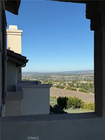 a view of a chairs and table on the terrace