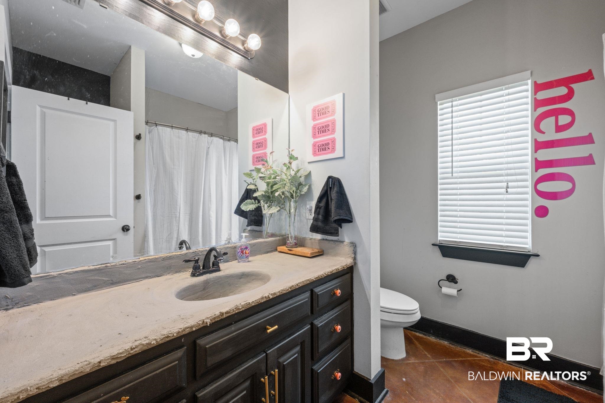 15635 North A N Brady Road Bay Minette, AL 36507 - Photo 32 of 51 Bathroom with tile patterned flooring, vanity, and toilet