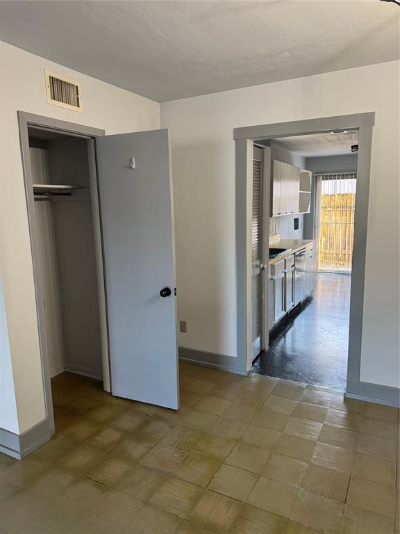7000 Creswell Road, Unit 108 Shreveport, LA 71106 - Photo 11 of 38 an entryway at a room and an empty room