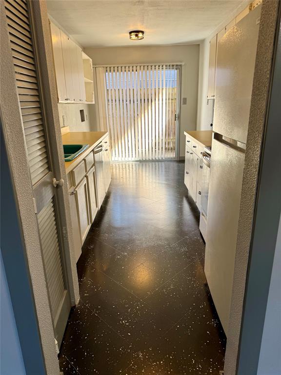 7000 Creswell Road, Unit 108 Shreveport, LA 71106 - Photo 21 of 38 a view of a hallway with wooden floor and staircase