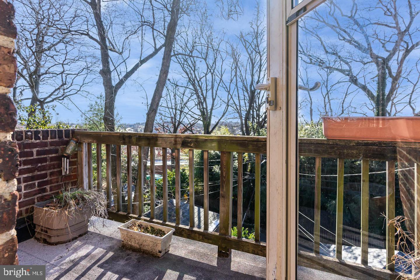 1221 Roundhill Road Baltimore, MD 21218 - Photo 28 of 47 Balcony off 3rd Bedroom