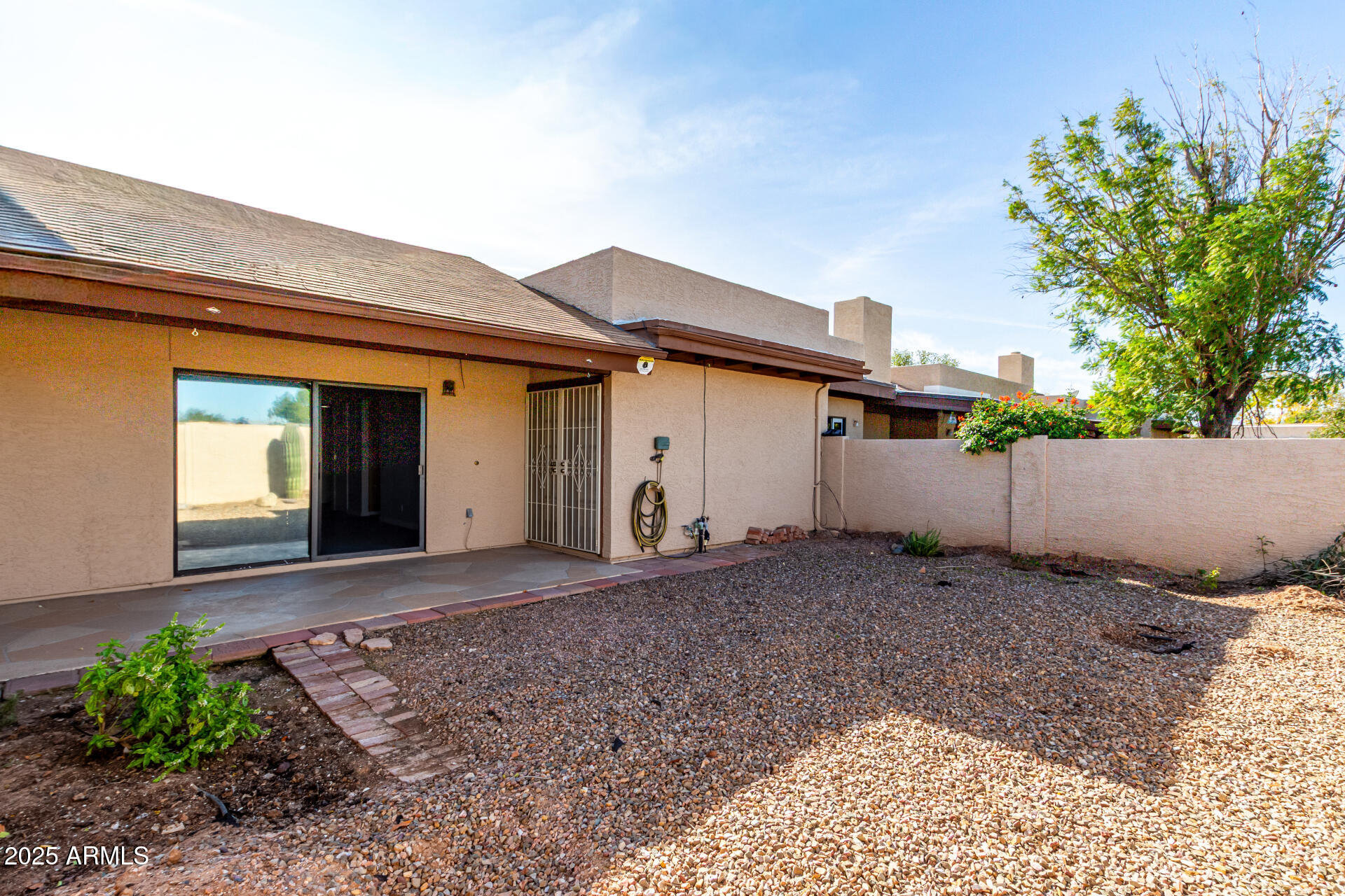 716 West Boxelder Place Chandler, AZ 85225 - Photo 14 of 15 a view of a house with a backyard