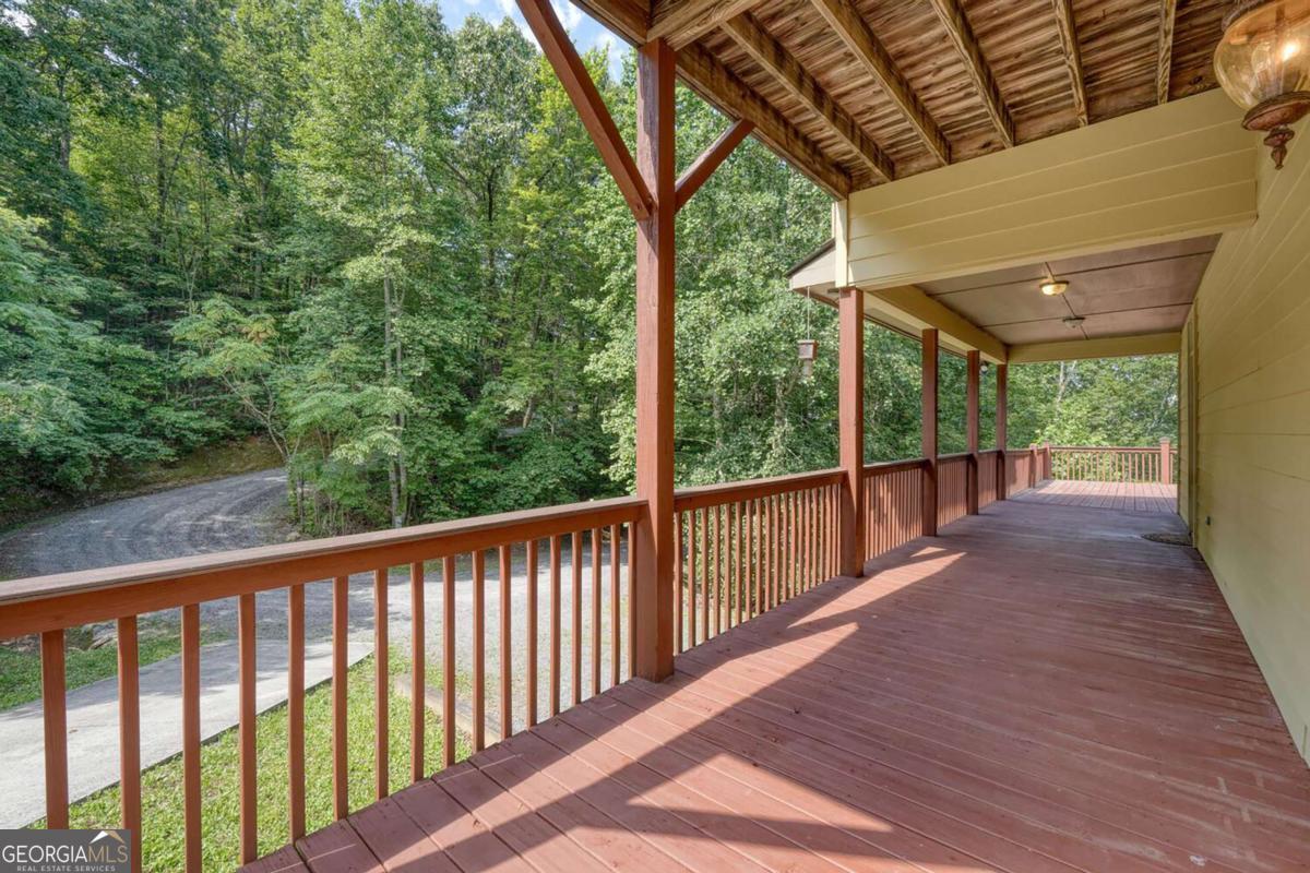 235 Oak Rdg Estate Murphy, NC 28906 - Photo 11 of 54 a view of a balcony with wooden floor