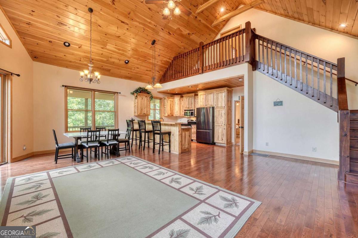 235 Oak Rdg Estate Murphy, NC 28906 - Photo 17 of 54 a view of a dining room with furniture window and wooden floor