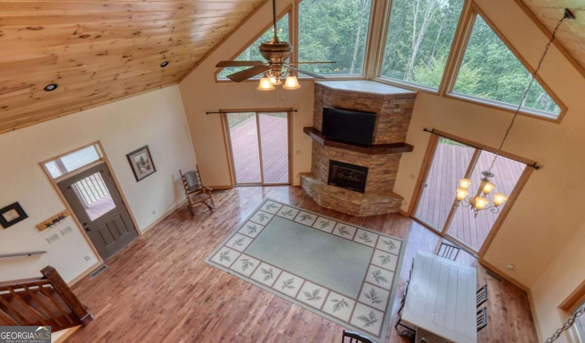 235 Oak Rdg Estate Murphy, NC 28906 - Photo 28 of 54 a living room with furniture and a fireplace