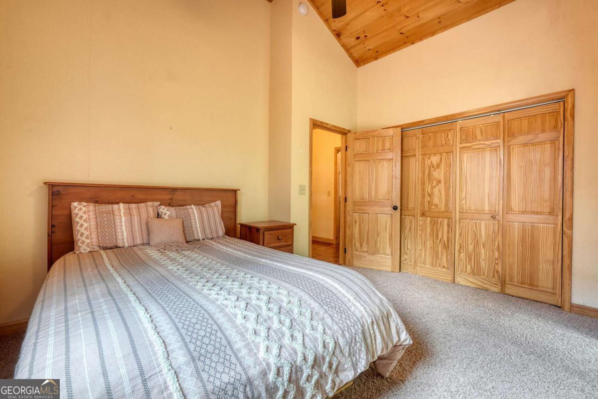 235 Oak Rdg Estate Murphy, NC 28906 - Photo 33 of 54 a bedroom with a bed and a table