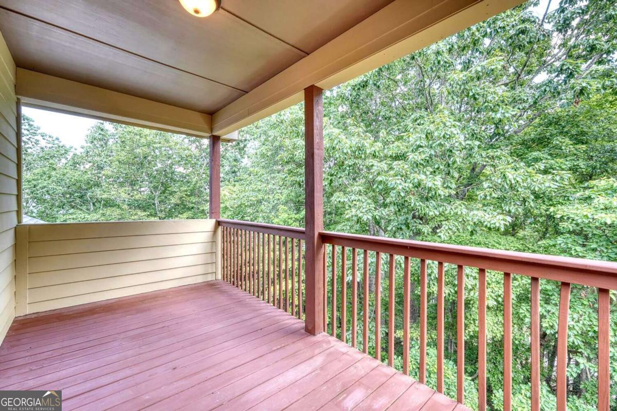 235 Oak Rdg Estate Murphy, NC 28906 - Photo 36 of 54 a view of a wooden deck next to a yard