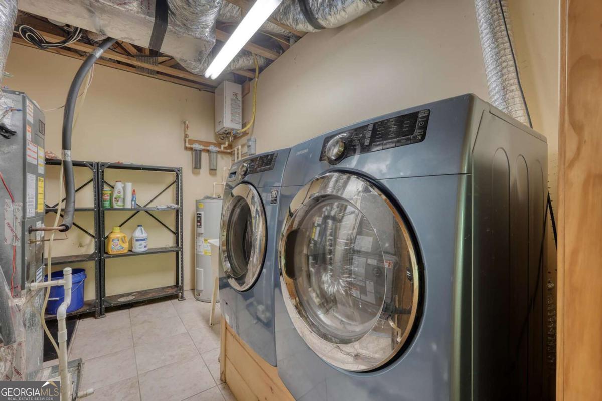 235 Oak Rdg Estate Murphy, NC 28906 - Photo 45 of 54 a utility room with dryer and washer