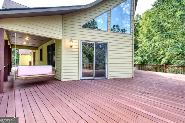 a view of a house with a roof deck