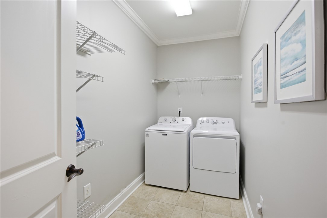 578 Sunset Point Drive West Union, SC 29696 - Photo 24 of 46 This laundry room offers convenience and ample storage for all your household needs.