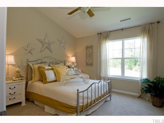 3023 Berkeley Street Raleigh, NC 27612 - Photo 5 of 10 Master Bedroom with vaulted ceilings and plant shelf