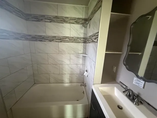 a bathroom with a bathtub